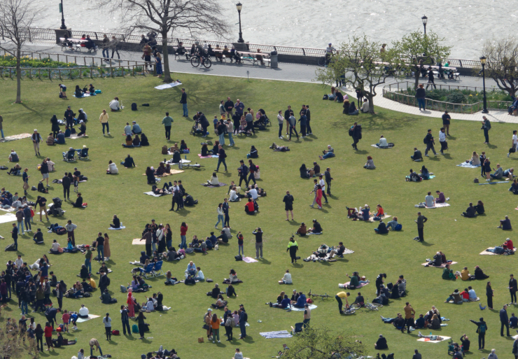 The Rockefeller Park lawn became a theater for eclipse watching and, for some, a picnic site, on April 8. Photo: April Koral/Tribeca Trib
